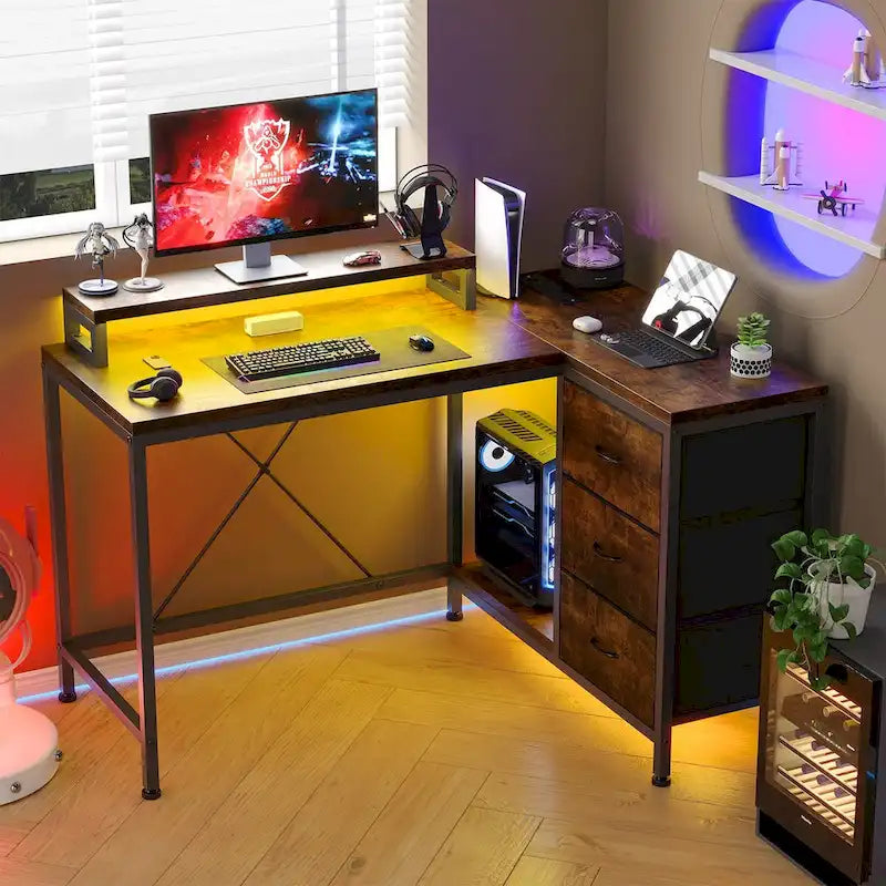 Scrivania da Gaming a L con Prese Elettriche e Luci LED