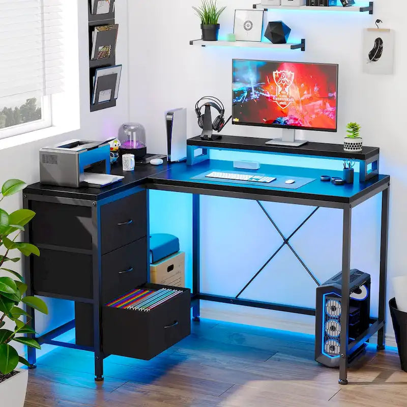 Scrivania da Gaming a L con Prese Elettriche e Luci LED