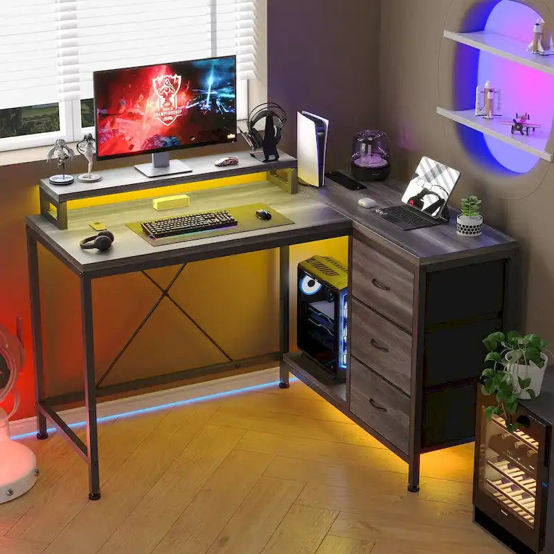 Scrivania da Gaming a L con Prese Elettriche e Luci LED